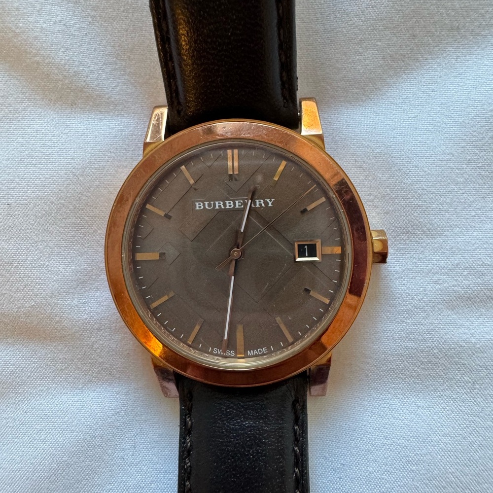 Burberry: unisex BU9013 large check brown leather strap watch.